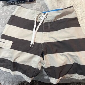 Black and tan rusty board shorts